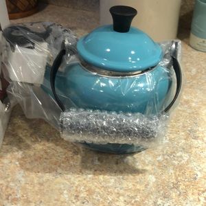 Le Creuset Tea Kettle. Brand new in box. never used. Caribbean blue color.